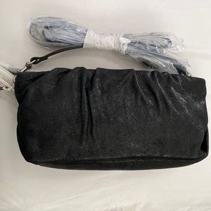 Lucky brand handbag with crossbody strap and wristlet. NWT.